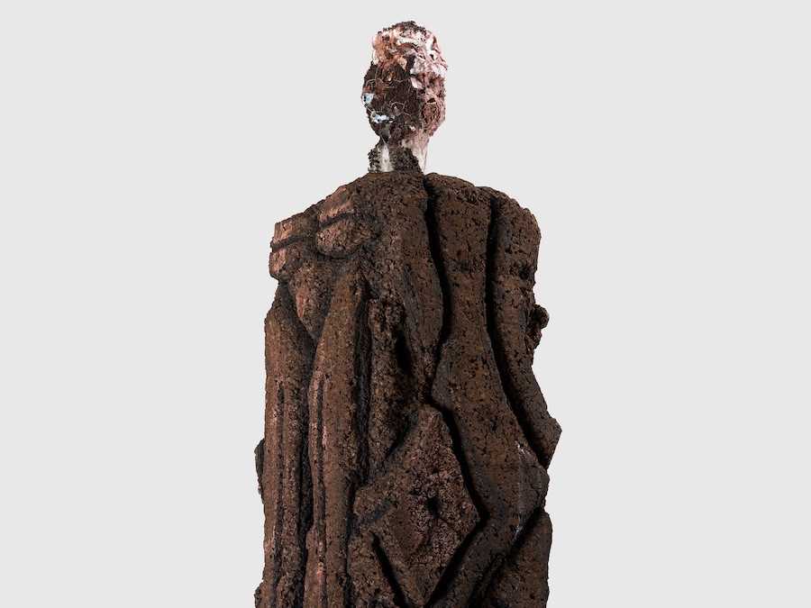 Bleed, 2025, cork, clay, wire, Styrofoam, bone, acrylic, oil stick, and wood, 88 5/8 × 36 1/8 × 36 1/8 inches (225.1 × 91.8 × 91.8 cm), courtesy of David Zwirner Gallery.